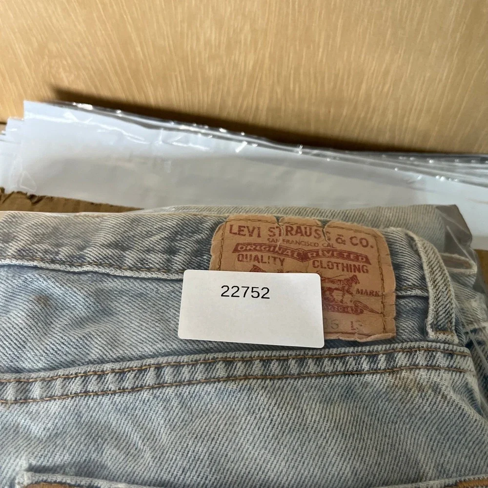 Levis‎ 550 Jeans Mens Size 36x34 Light Wash Distressed Relaxed Tapered